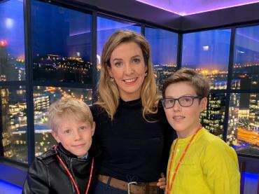 Tessy Antony de Nassau In Studio Smiling With Her 2 Sons With City of Luxembourg In The Background